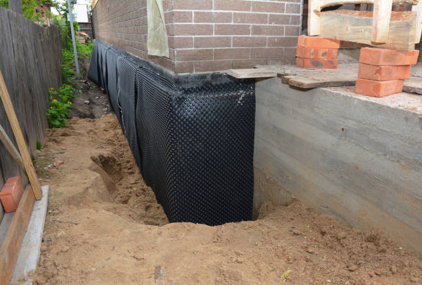 SJ Waterproofing Pros technician performing targeted Exterior Waterproofing assessment in Jessup, PA